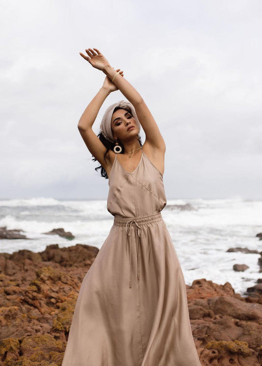 Image of a model wearing Tops. Product name - Clover Sleeveless Silk Cami Bronze in Bronze colour by brand - Lou Lou