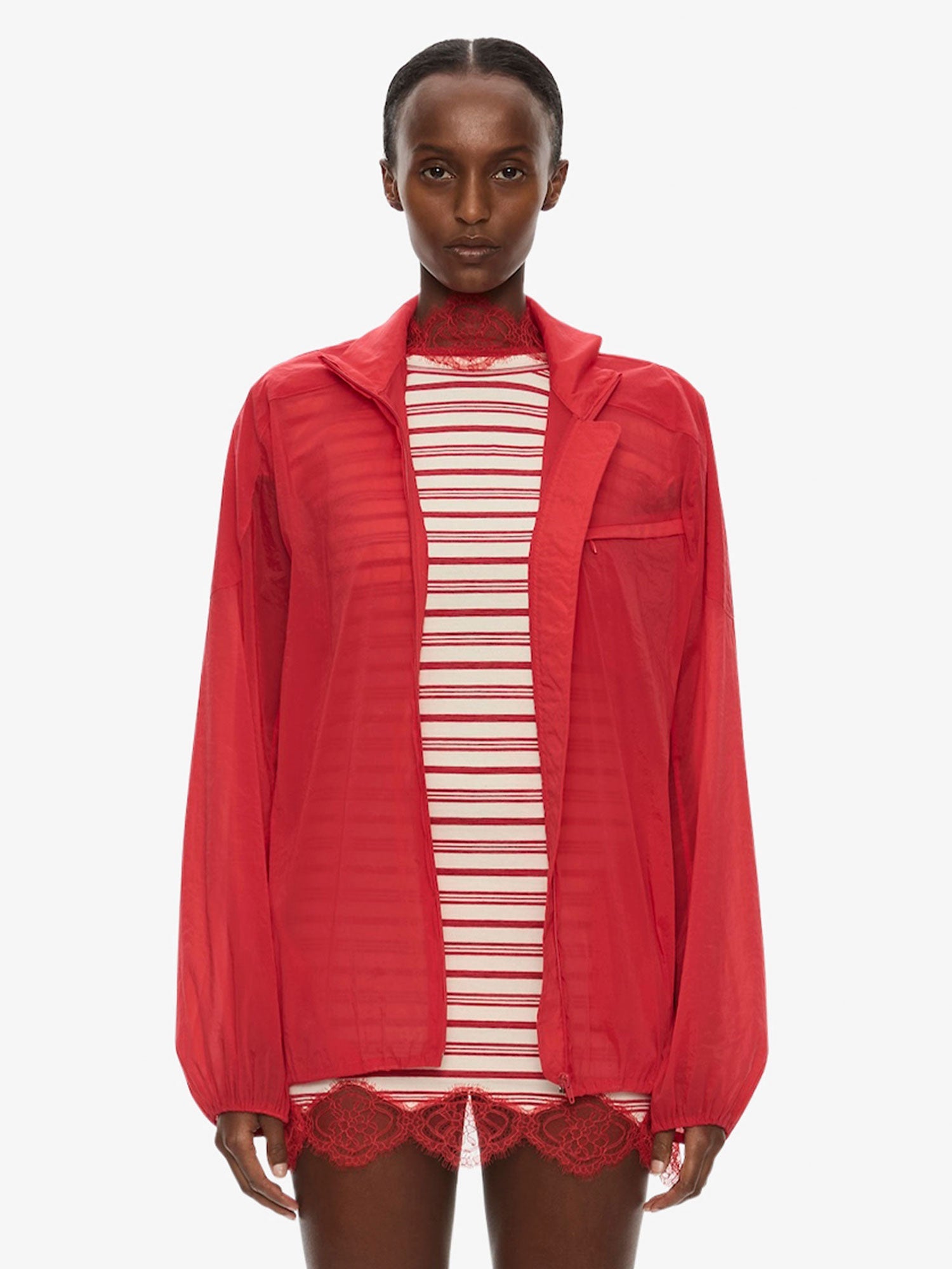 Image of a model wearing Outerwear. Product name - Dannie Lucent Mottled Sheer Bomber in Flame colour by brand - CHRISTOPHER ESBER