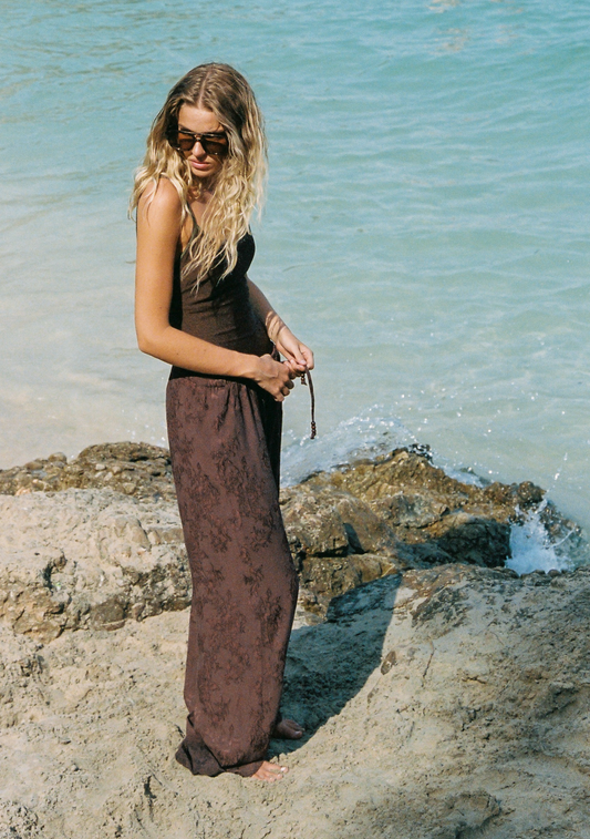 Image of a model wearing Pants. Productname: Auguste The Label Martha Pants in Tan/Brown colour by brand - Auguste The Label