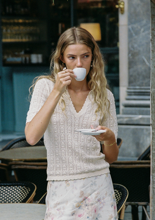 Image of a model wearing Outerwear. Productname: Auguste The Label Jude Knit Tee in White colour by brand - Auguste The Label