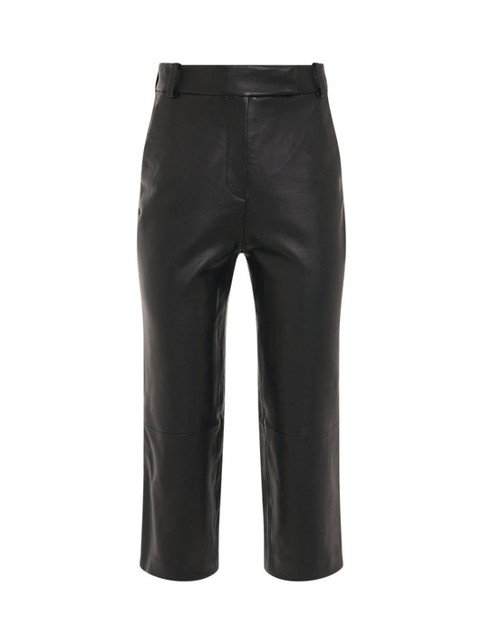 Image of a model wearing Pants. Productname: KHAITE Melie Pant in Black colour by brand - KHAITE