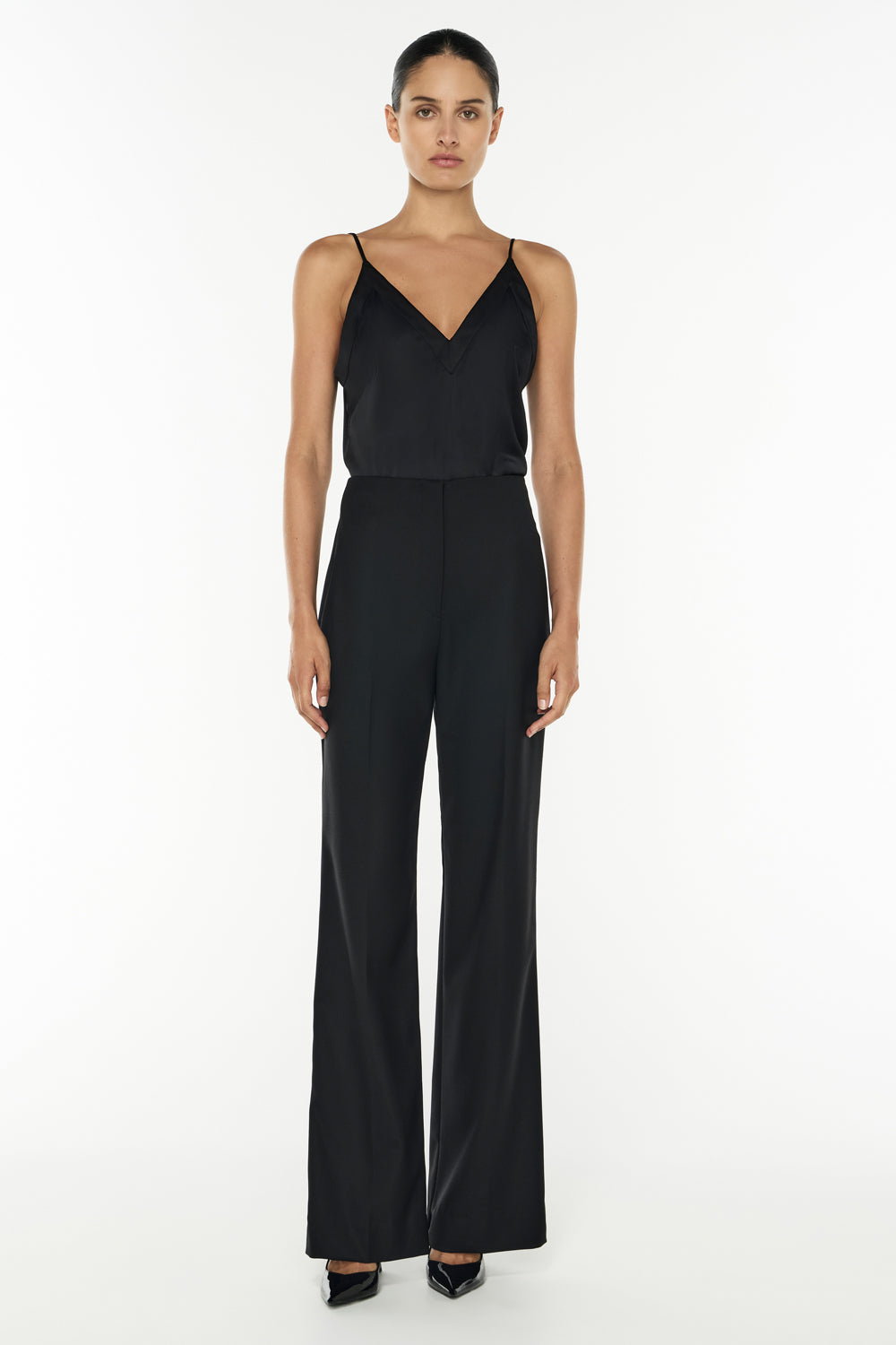 Image of a model wearing Pants. Productname: Major Suit High Waisted Pant in BLACK colour by brand - Manning Cartell