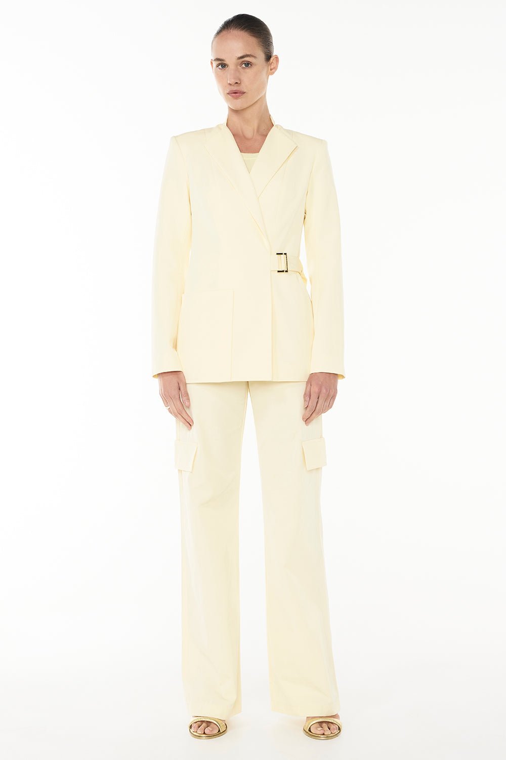 Image of a model wearing Pants. Productname: Dune Rider Cargo Pant in PALE YELLOW colour by brand - Manning Cartell
