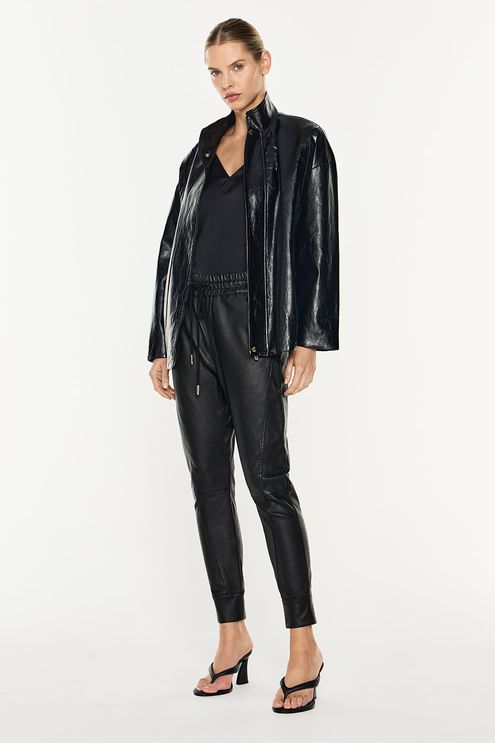 Image of a model wearing Pants. Productname: Future Icon Stretch Leather Pant in Black colour by brand - Manning Cartell