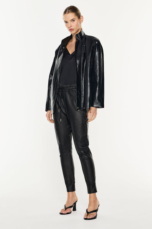 Image of a model wearing Pants. Productname: Future Icon Stretch Leather Pant in Black colour by brand - Manning Cartell