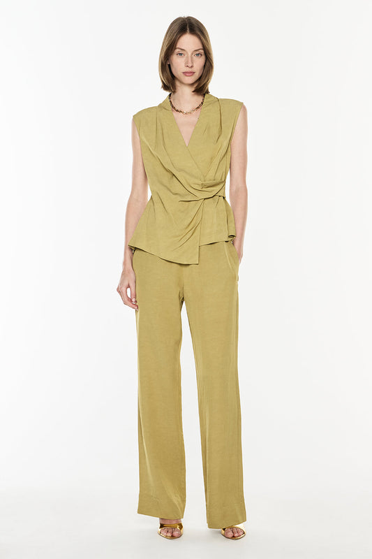 Image of a model wearing Pants. Productname: Final Note Pull On Pant in Khaki Gold colour by brand - Manning Cartell