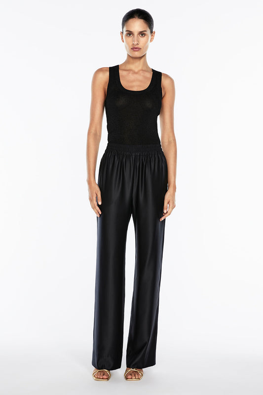 Image of a model wearing Pants. Productname: Neutral Stance Pant in Black colour by brand - Manning Cartell