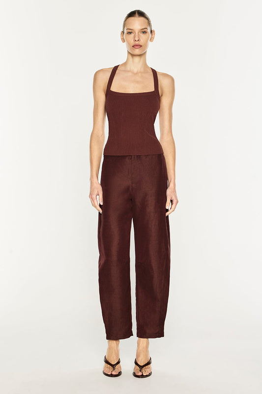 Image of a model wearing Pants. Product name - Rich Mix Balloon Pant in Cocoa Brown colour by brand - MANNING CARTELL