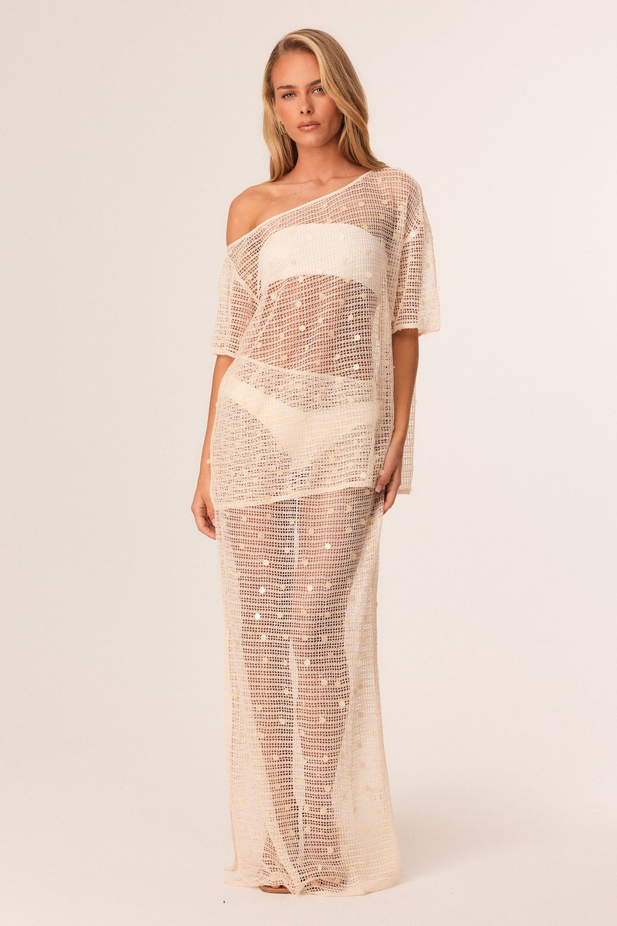 Image of a model wearing Skirts. Productname: SNDYS ALTHEA MAXI SKIRT in Cream colour by brand - SNDYS