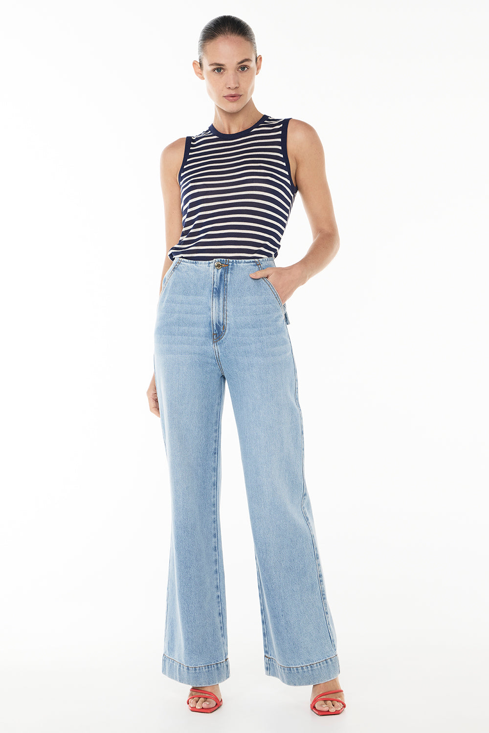 Image of a model wearing Denim. Productname: Cote Classic High Wasted Jean in INDIGO colour by brand - Manning Cartell