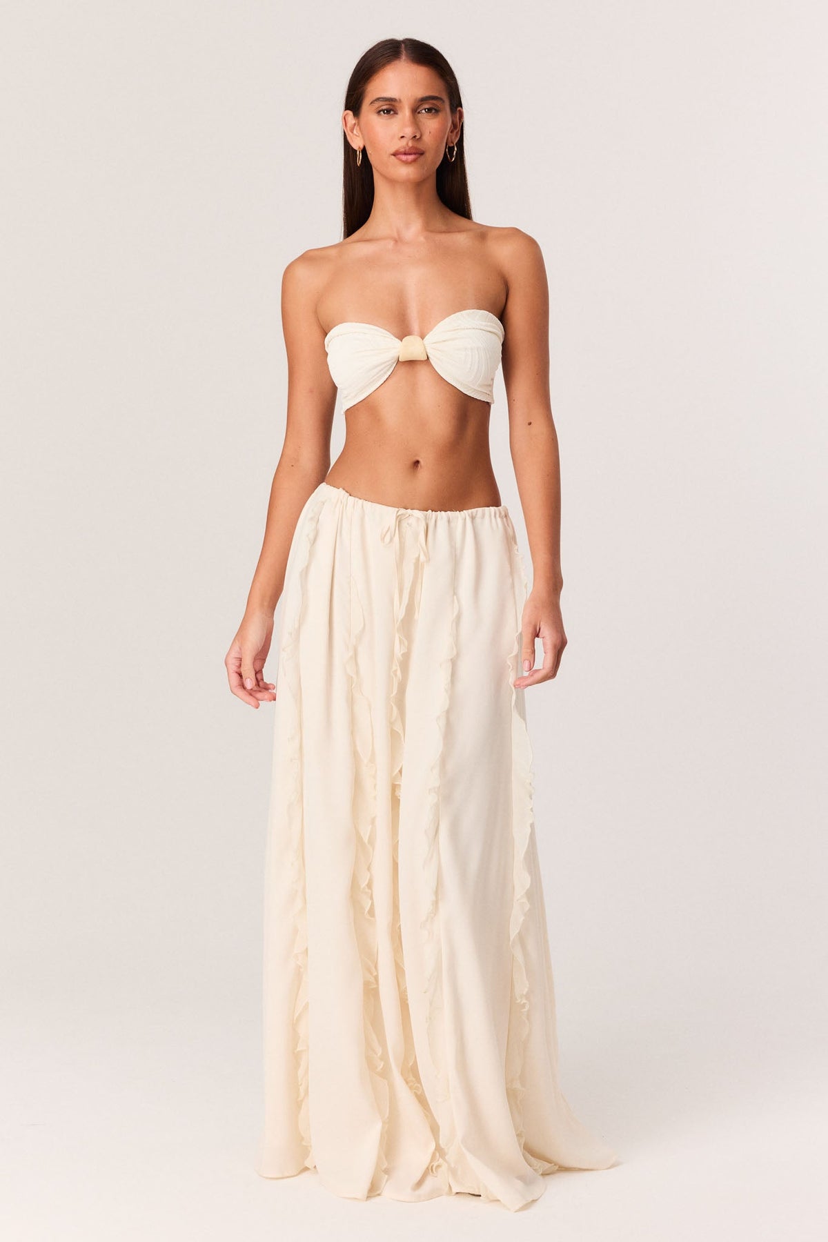 Image of a model wearing Skirts. Productname: SNDYS SEREIA MAXI SKIRT in Oyster colour by brand - SNDYS