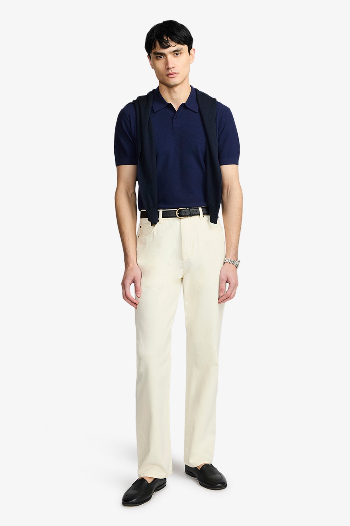 Image of a model wearing Tops. Product name - Frame Blue Honeycomb Polo in Blue colour by brand - Anthony Squires