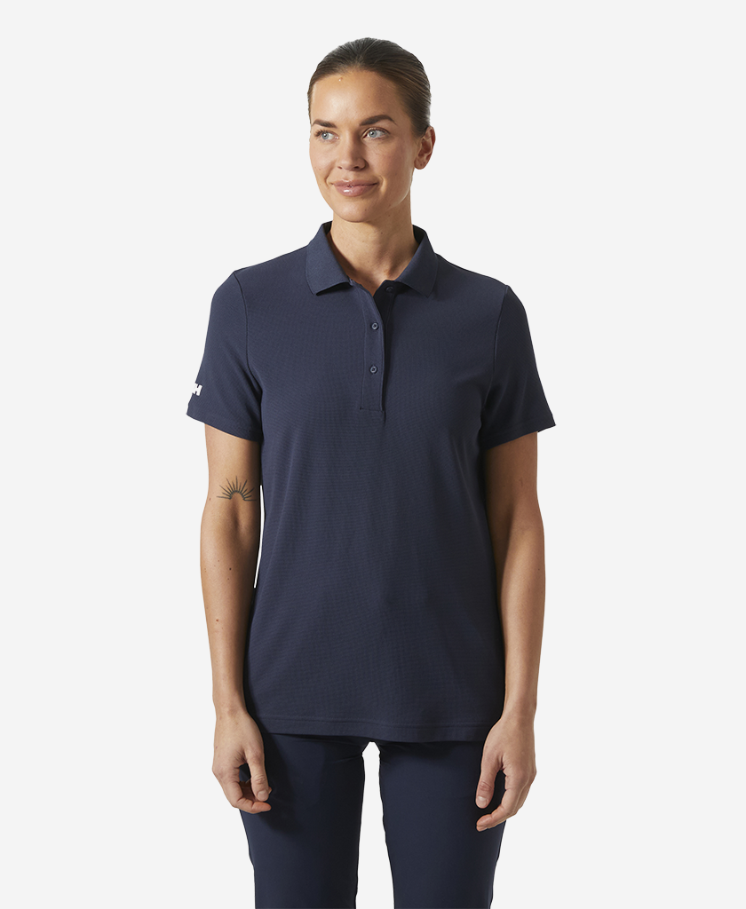 Image of a model wearing Tops. Product name - W CREW TECH POLO, Navy in Navy colour by brand - Helly Hansen