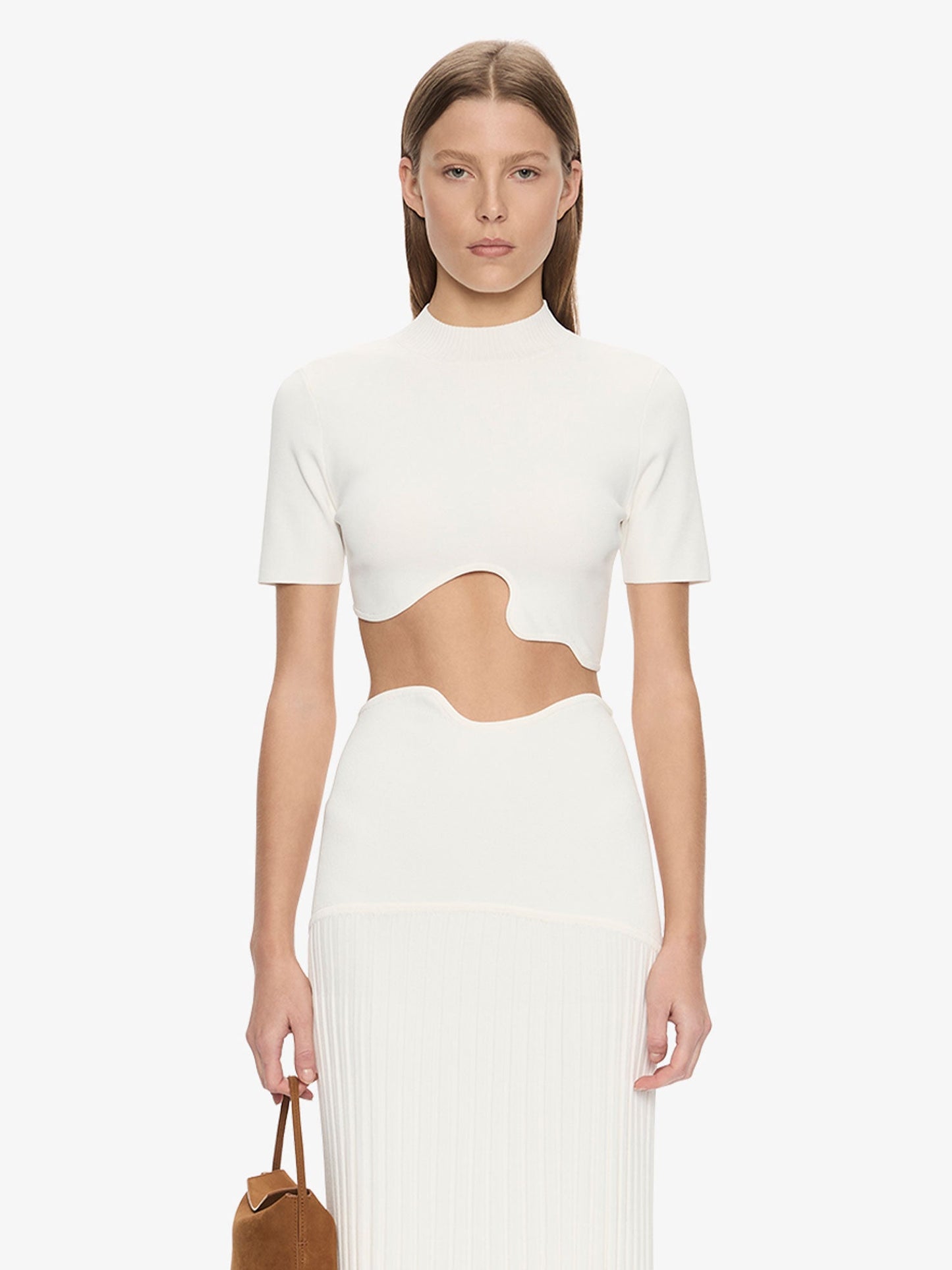 Image of a model wearing Tops. Product name - Maparadita Top in White colour by brand - CHRISTOPHER ESBER