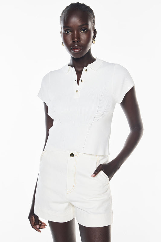 Image of a model wearing Tops. Productname: Firm Favourite Knit Polo in WHITE colour by brand - Manning Cartell