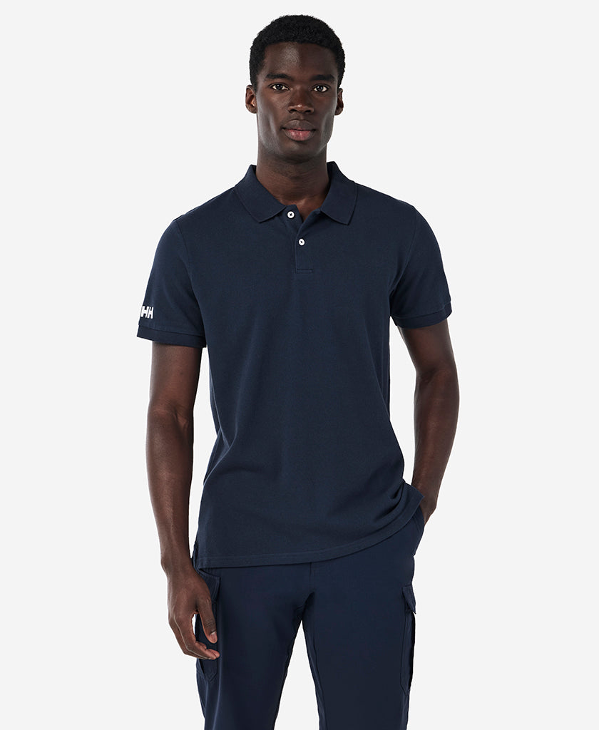 Image of a model wearing Tops. Product name - CREW POLO, Navy in Navy colour by brand - Helly Hansen