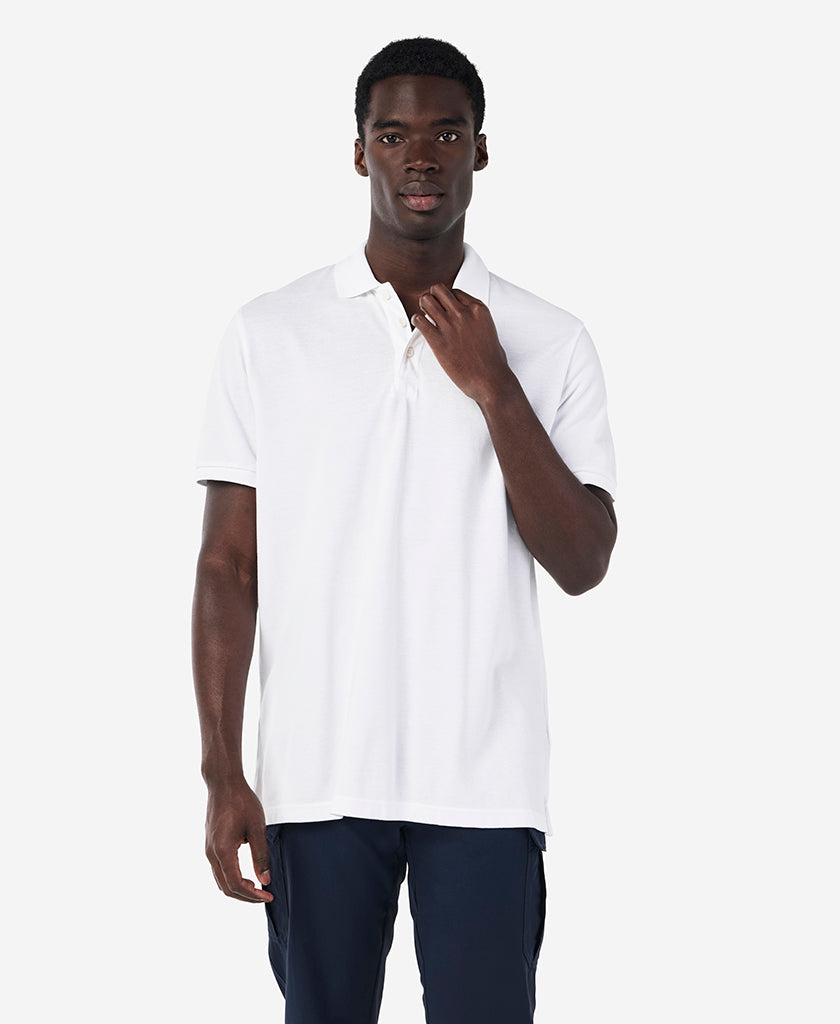 Image of a model wearing Tops. Product name - CREW POLO, White in White colour by brand - Helly Hansen