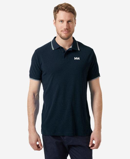 Image of a model wearing Tops. Product name - KOS POLO, Navy in Navy colour by brand - Helly Hansen