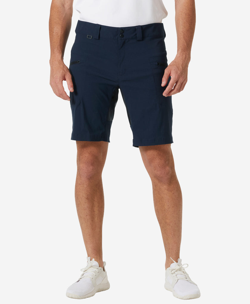 Image of a model wearing Shorts. Product name - HP RACING DECK SHORTS 2.0, Navy in Navy colour by brand - Helly Hansen