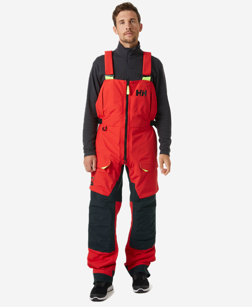 Image of a model wearing Pants. Product name - AEGIR RACE BIB, Alert Red in Alert Red colour by brand - Helly Hansen