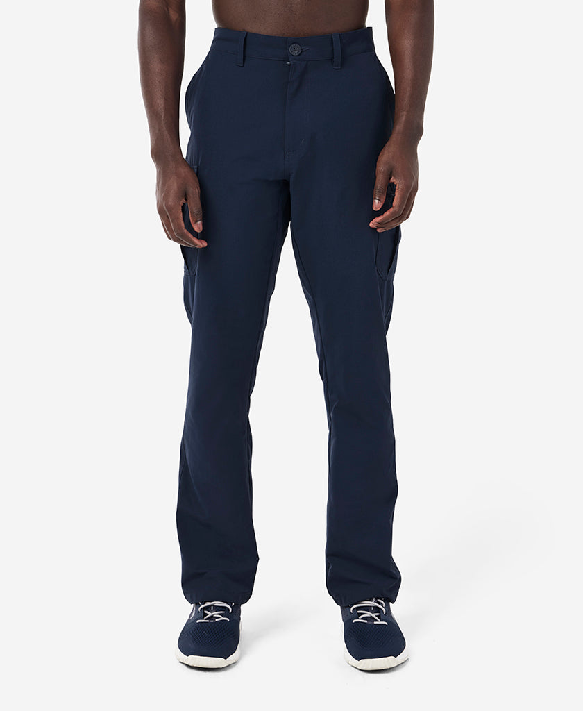Image of a model wearing Pants. Product name - HH QD CARGO PANT, Navy in Navy colour by brand - Helly Hansen