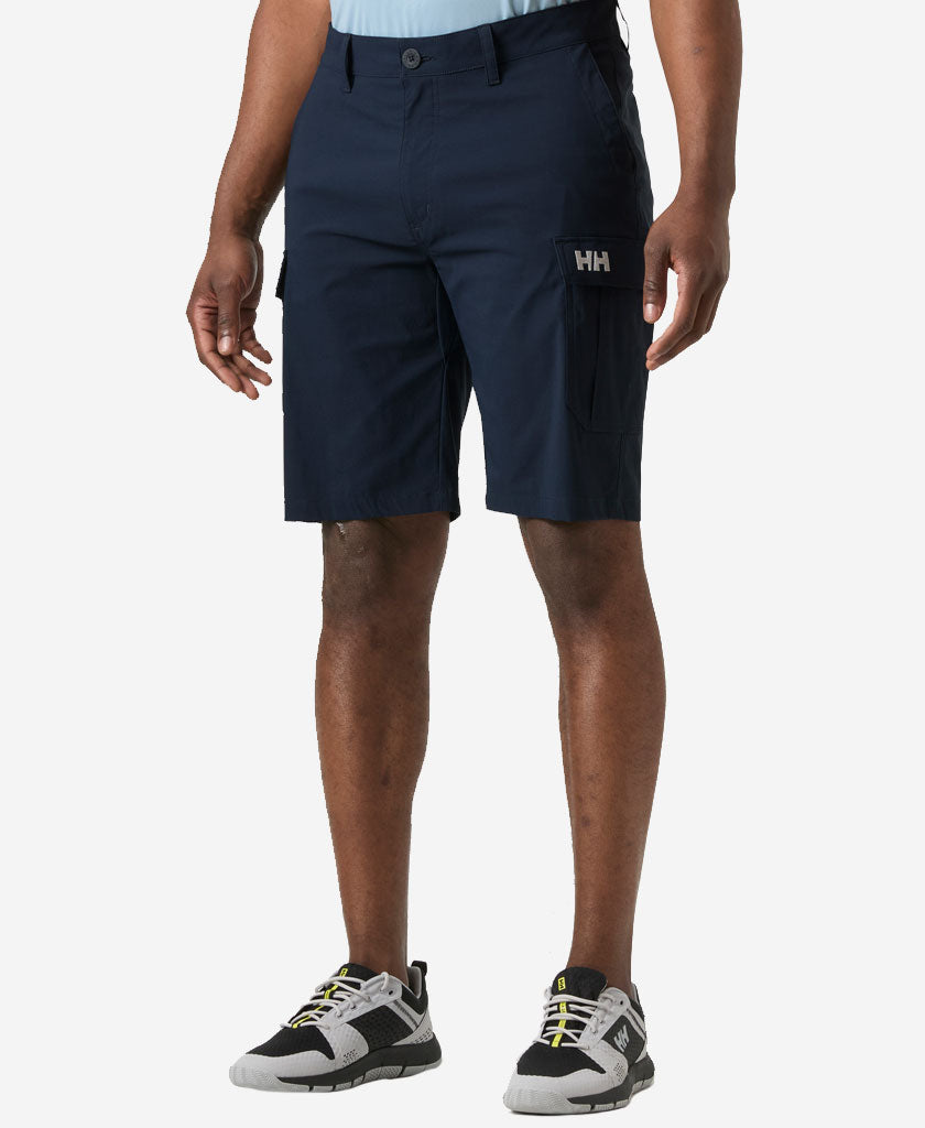 Image of a model wearing Shorts. Product name - HH QD CARGO SHORTS 11", Navy in Navy colour by brand - Helly Hansen