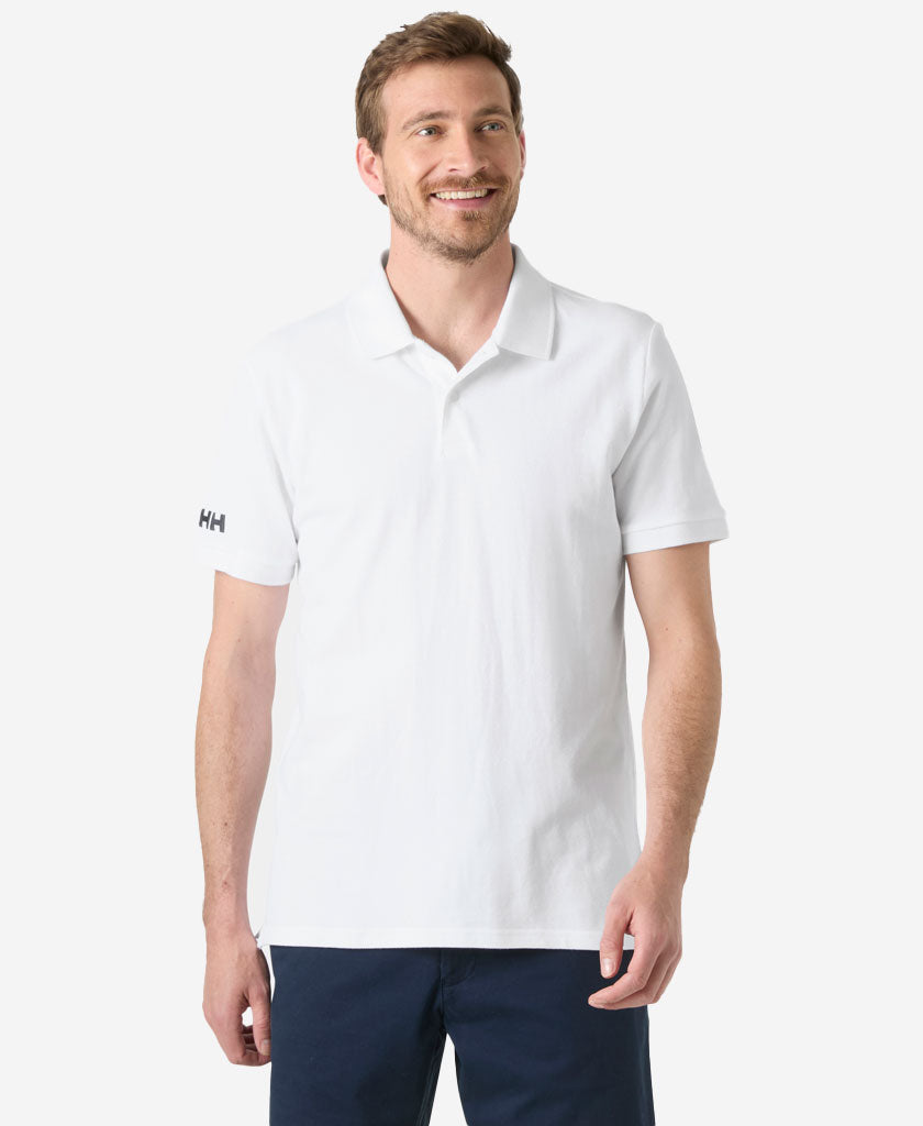 Image of a model wearing Tops. Product name - CREW POLO PIQUE, White in White colour by brand - Helly Hansen