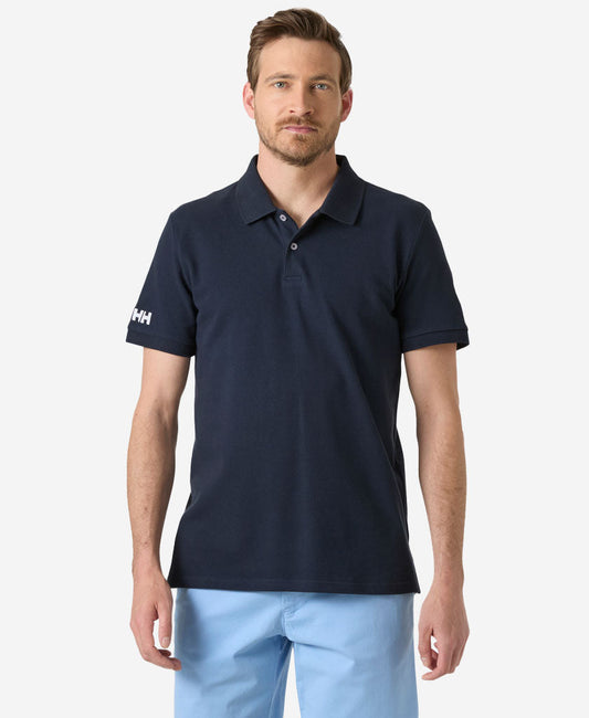 Image of a model wearing Tops. Product name - CREW POLO PIQUE, Navy in Navy colour by brand - Helly Hansen