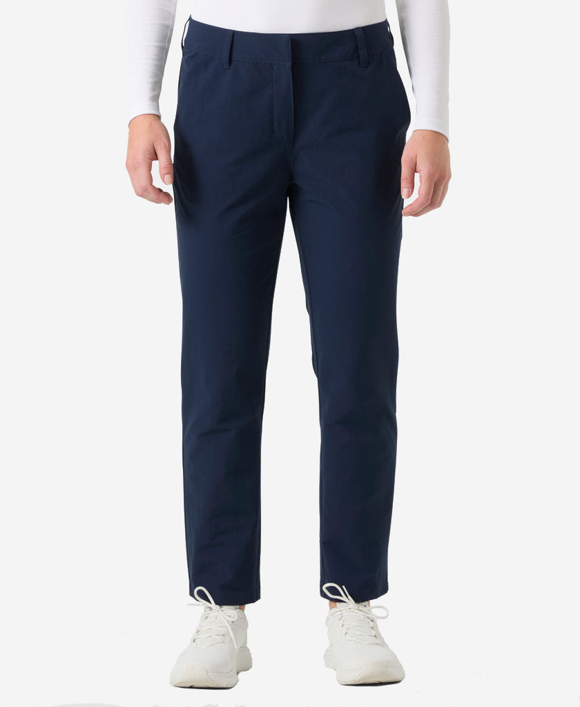 Image of a model wearing Pants. Product name - W QD PANT, Navy in Navy colour by brand - Helly Hansen