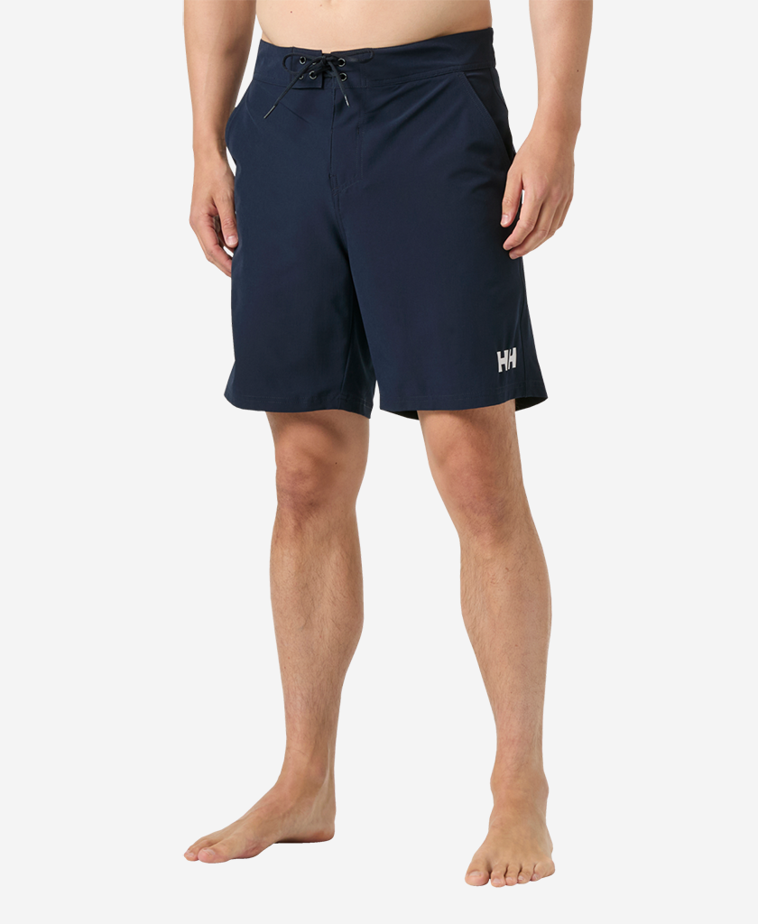 Image of a model wearing Shorts. Product name - NEWPORT BOARD SHORTS 8", Navy in Navy colour by brand - Helly Hansen