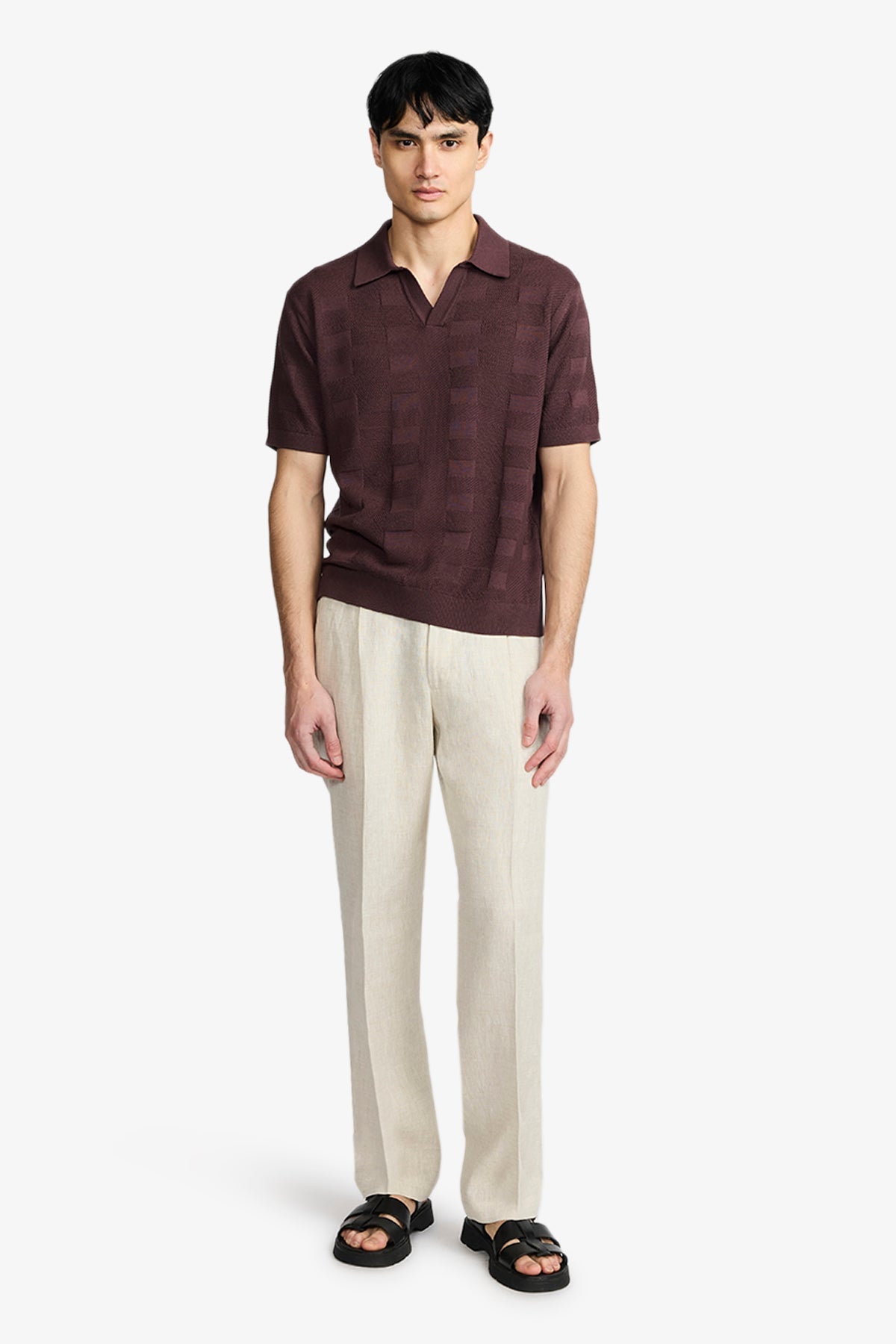 Image of a model wearing Tops. Product name - Array Tobacco Polo In Supima Cotton in Tobacco colour by brand - Anthony Squires