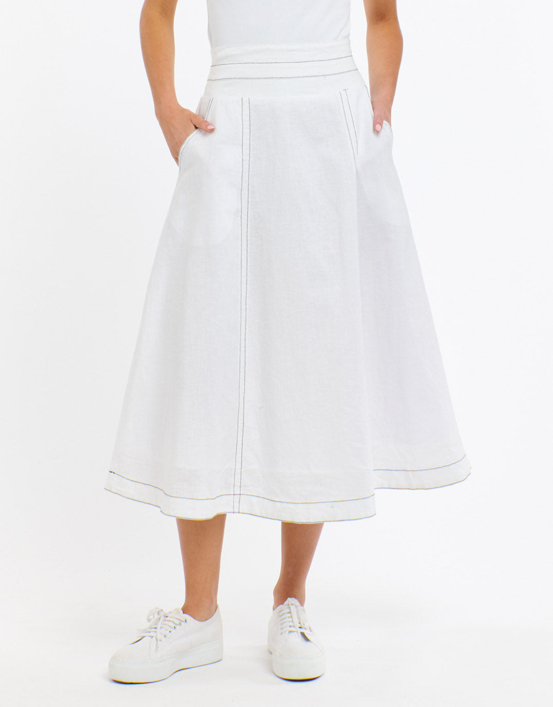 Image of a model wearing Skirts. Productname: Dakota Linen Skirt - White with Choc Stitch in White With Choco Stitch colour by brand - 365 Days
