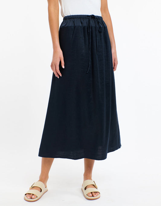 Image of a model wearing Skirts. Productname: Maison Skirt - in Navy colour by brand - 365 Days