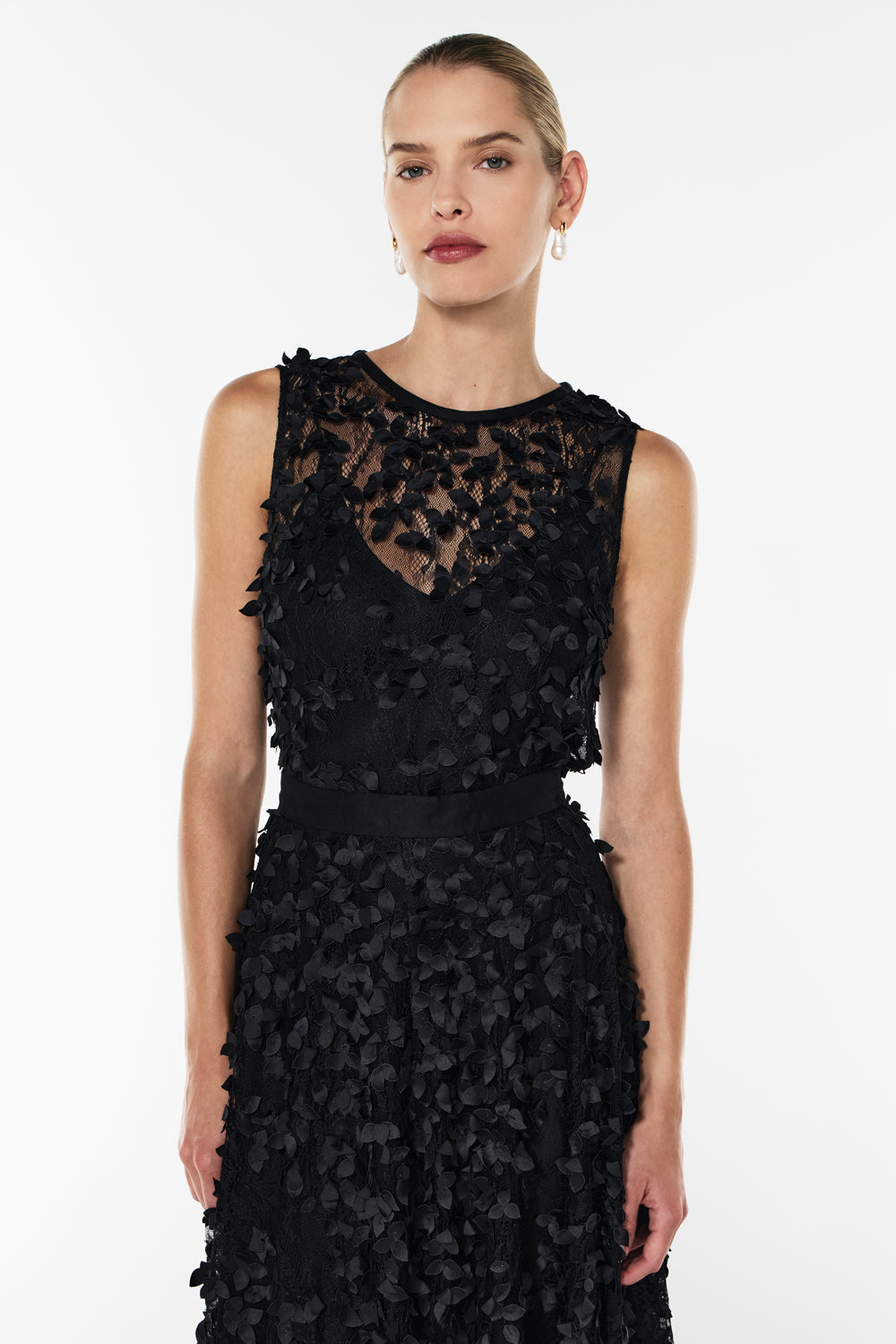 Image of a model wearing Tops. Productname: Enchantment Tank in BLACK colour by brand - Manning Cartell