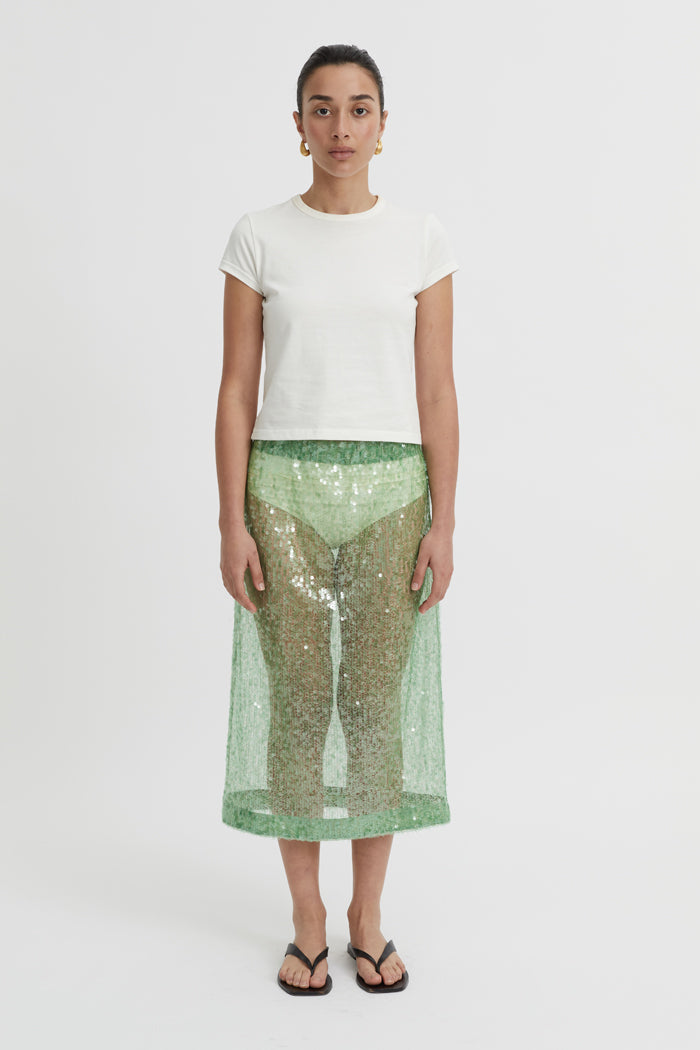 Image of a model wearing Skirts. Product name - Luma Skirt Green in Green colour by brand - Blanca Studio