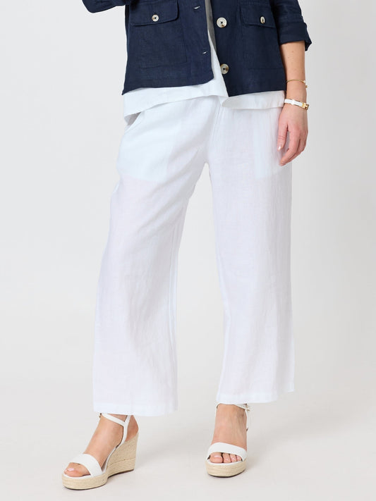 Image of a model wearing Pants. Product name - Lara Linen Wide Leg Pant White in White colour by brand - Gordon Smith