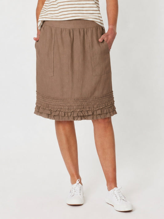 Image of a model wearing Skirts. Product name - Ruffle Hem Skirt Mocha in Mocha colour by brand - Gordon Smith