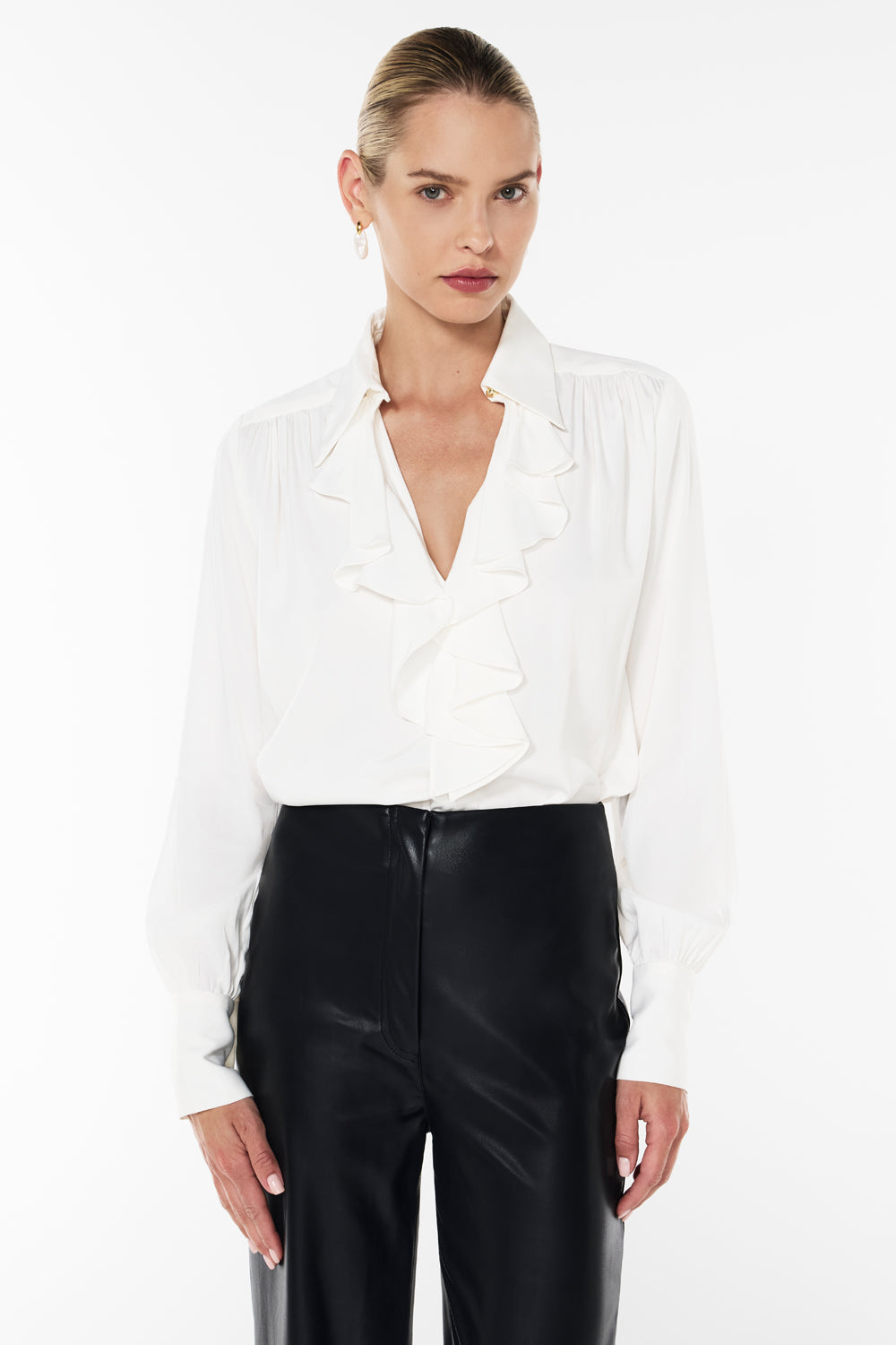 Image of a model wearing Tops. Productname: Cupids Bow Long Sleeve Shirt in White colour by brand - Manning Cartell