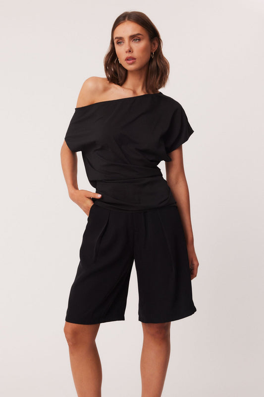 Image of a model wearing Tops. Productname: SNDYS NOAH TOP in Black colour by brand - SNDYS