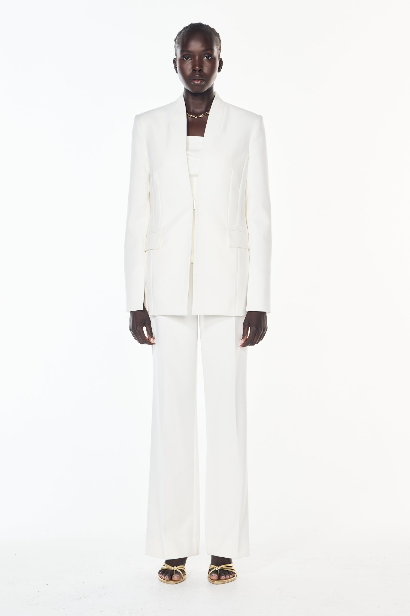 Image of a model wearing Outerwear. Productname: Future Dreaming Blazer in WHITE colour by brand - Manning Cartell
