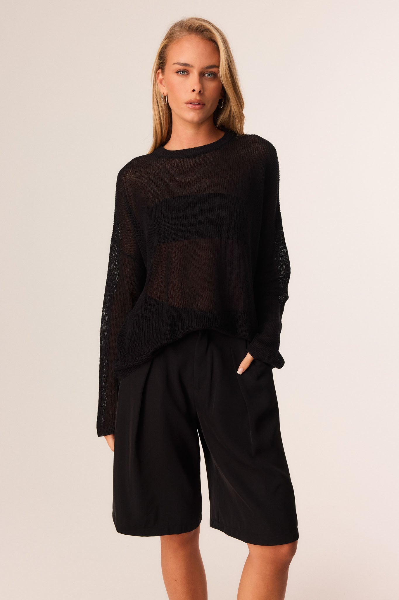 Image of a model wearing Outerwear. Productname: SNDYS BOBBI JUMPER in Black colour by brand - SNDYS