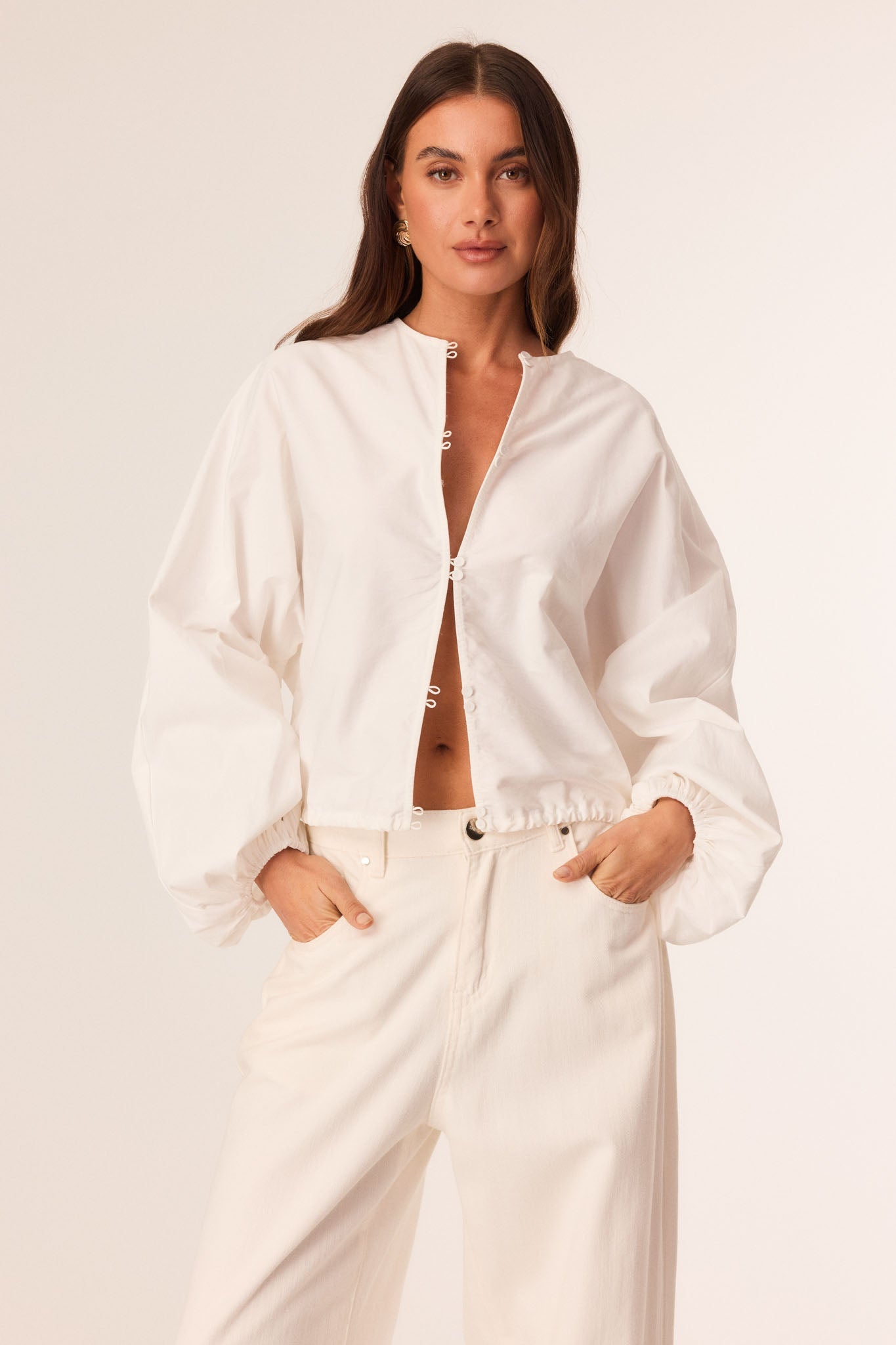 Image of a model wearing Tops. Productname: SNDYS MONA SHIRT in Off White colour by brand - SNDYS