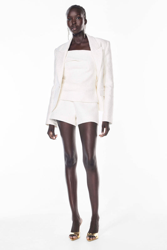 Image of a model wearing Tops. Productname: Prized Pieces Bustier in WHITE colour by brand - Manning Cartell