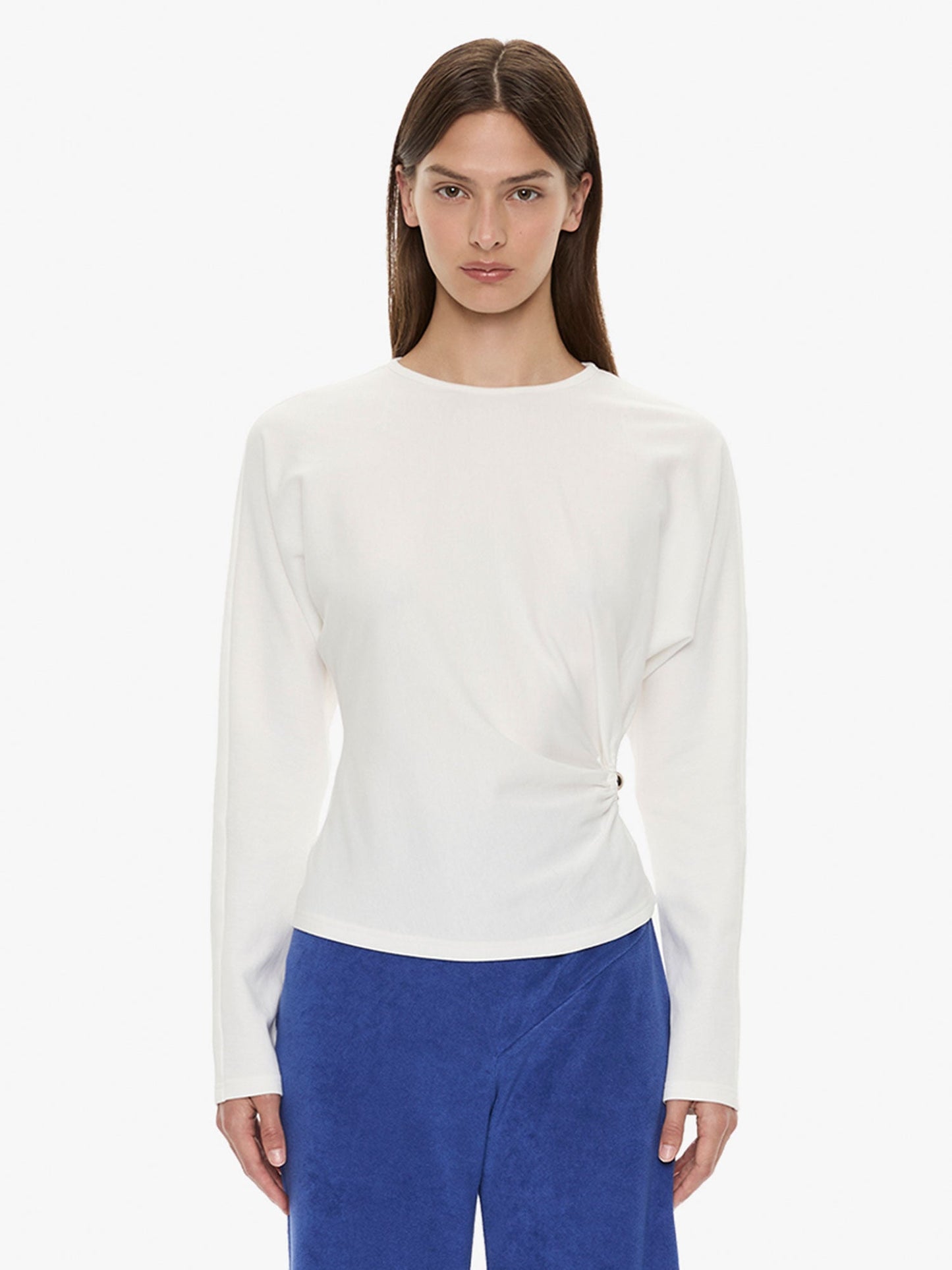 Image of a model wearing Tops. Product name - Orbit Ruched Magyar Top in White colour by brand - CHRISTOPHER ESBER