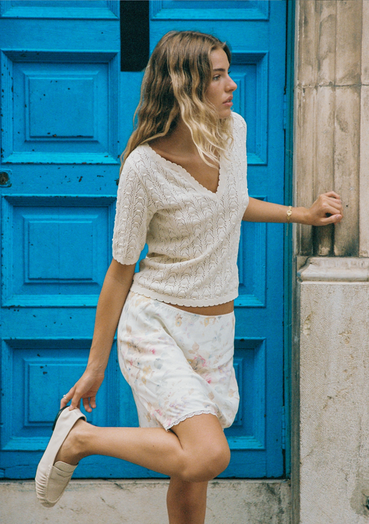 Image of a model wearing Skirts. Productname: Auguste The Label Charlotte Mini Skirt in Print colour by brand - Auguste The Label