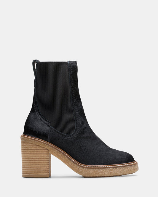 Image of a model wearing Tops. Productname: Cassiano Top Black Interest in Black Interest colour by brand - Clarks