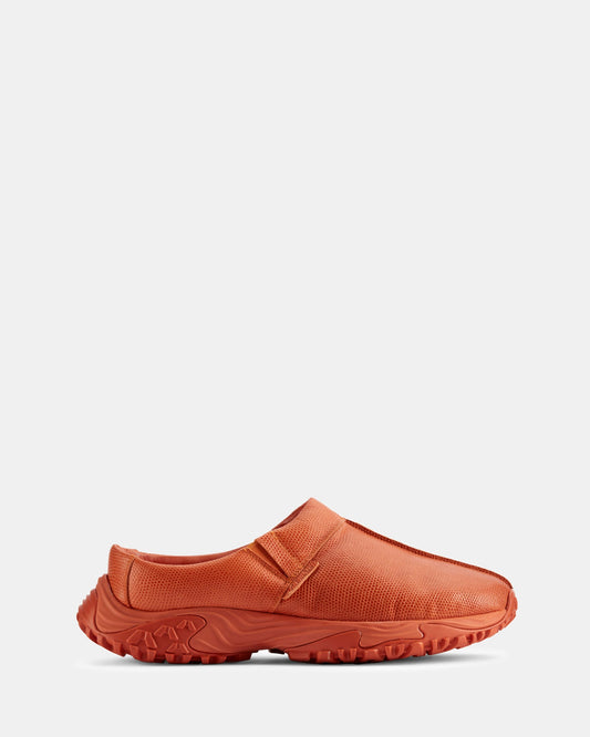Image of Slippers. Productname: Cur Clog 1 M Orange Int Lea in Orange Int Lea colour by brand - Clarks