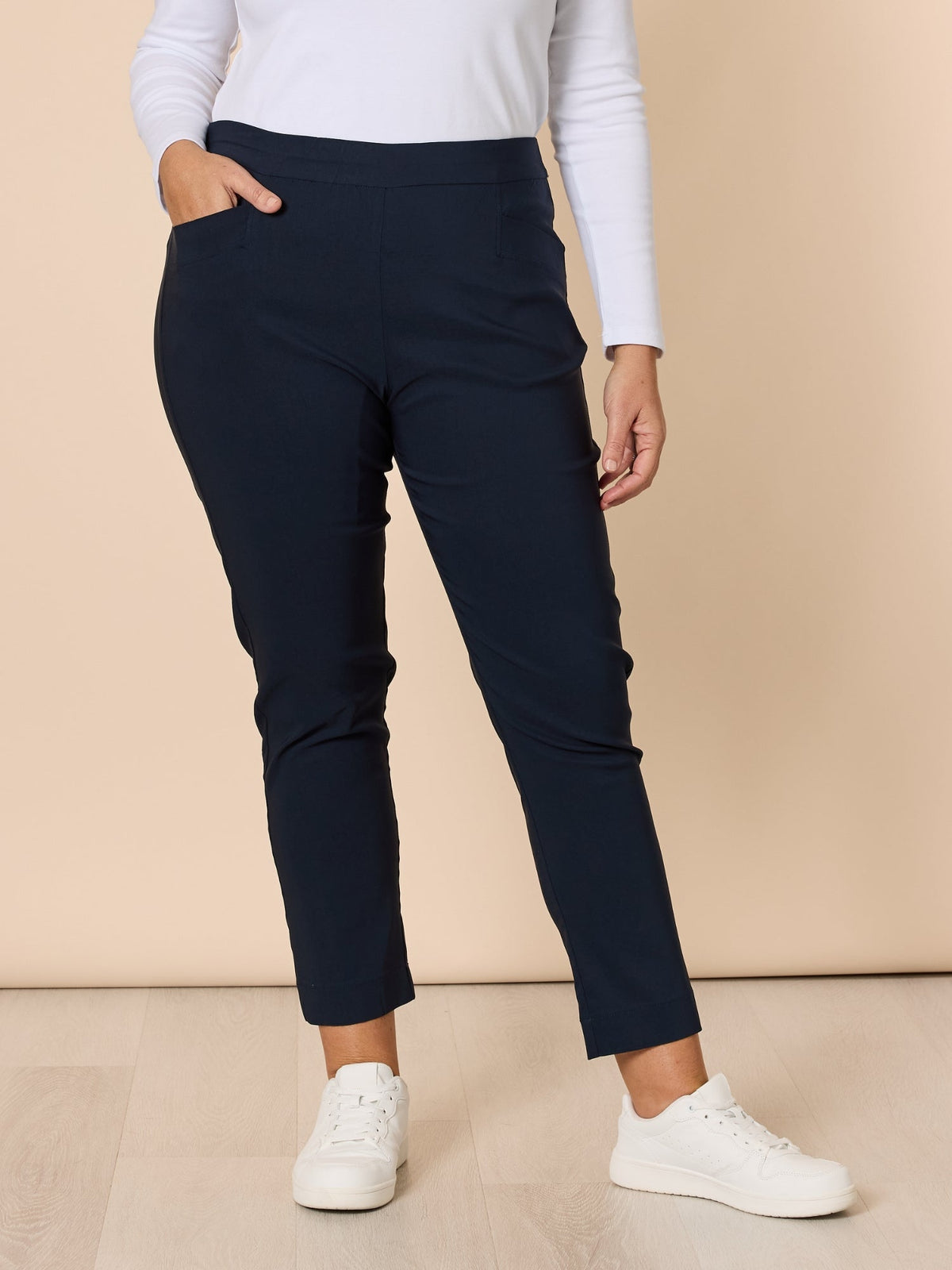 Image of a model wearing Pants. Product name - Harbour Pant Navy in Navy colour by brand - Gordon Smith