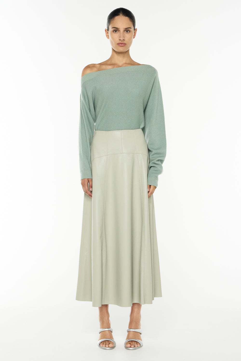 Image of a model wearing Skirts. Productname: Infinite Limits Skirt in SAGE colour by brand - Manning Cartell