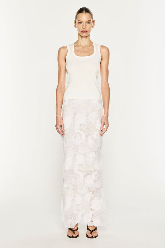 Image of a model wearing Skirts. Product name - Sheer Force Maxi Skirt in White colour by brand - MANNING CARTELL